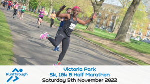 A woman running and cheering at the same time
