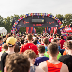 Hackney Half Marathon start point, there is a big crowd of runners waiting to start the race.