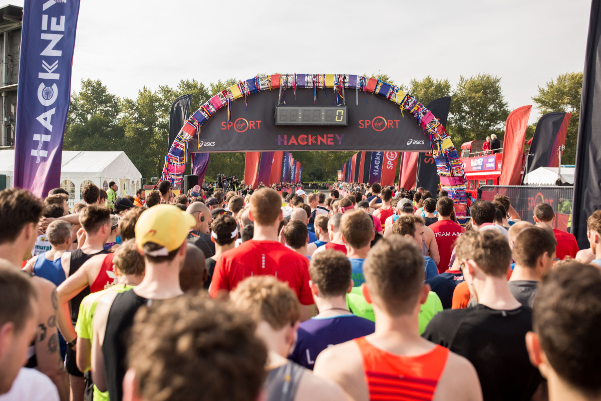 Hackney Half Marathon start point, there is a big crowd of runners waiting to start the race.