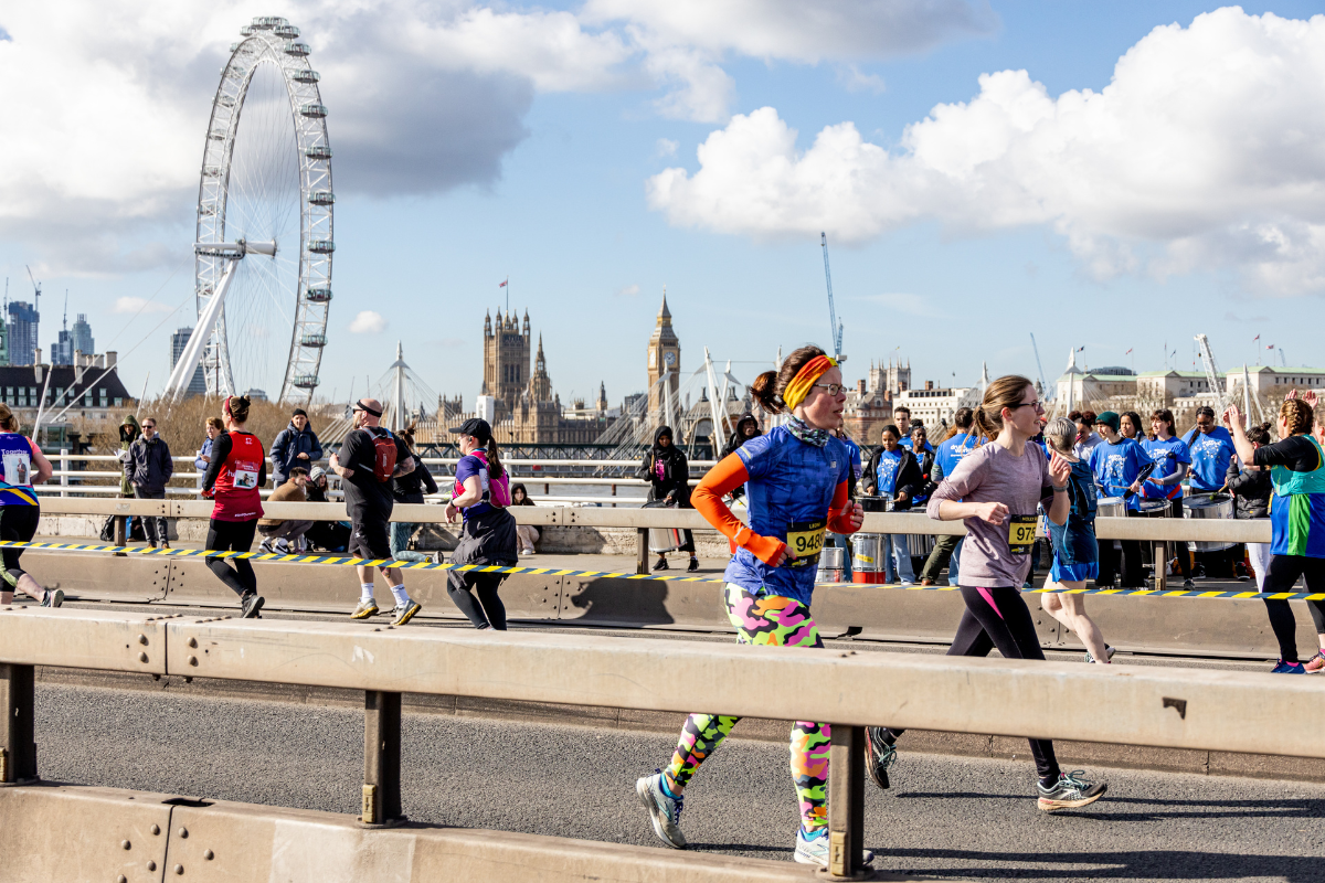 Runners taking part in the half marathon, in the back ground is the London Eye.