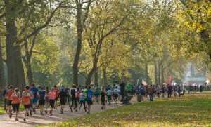 Large crowds of people running a marathon.