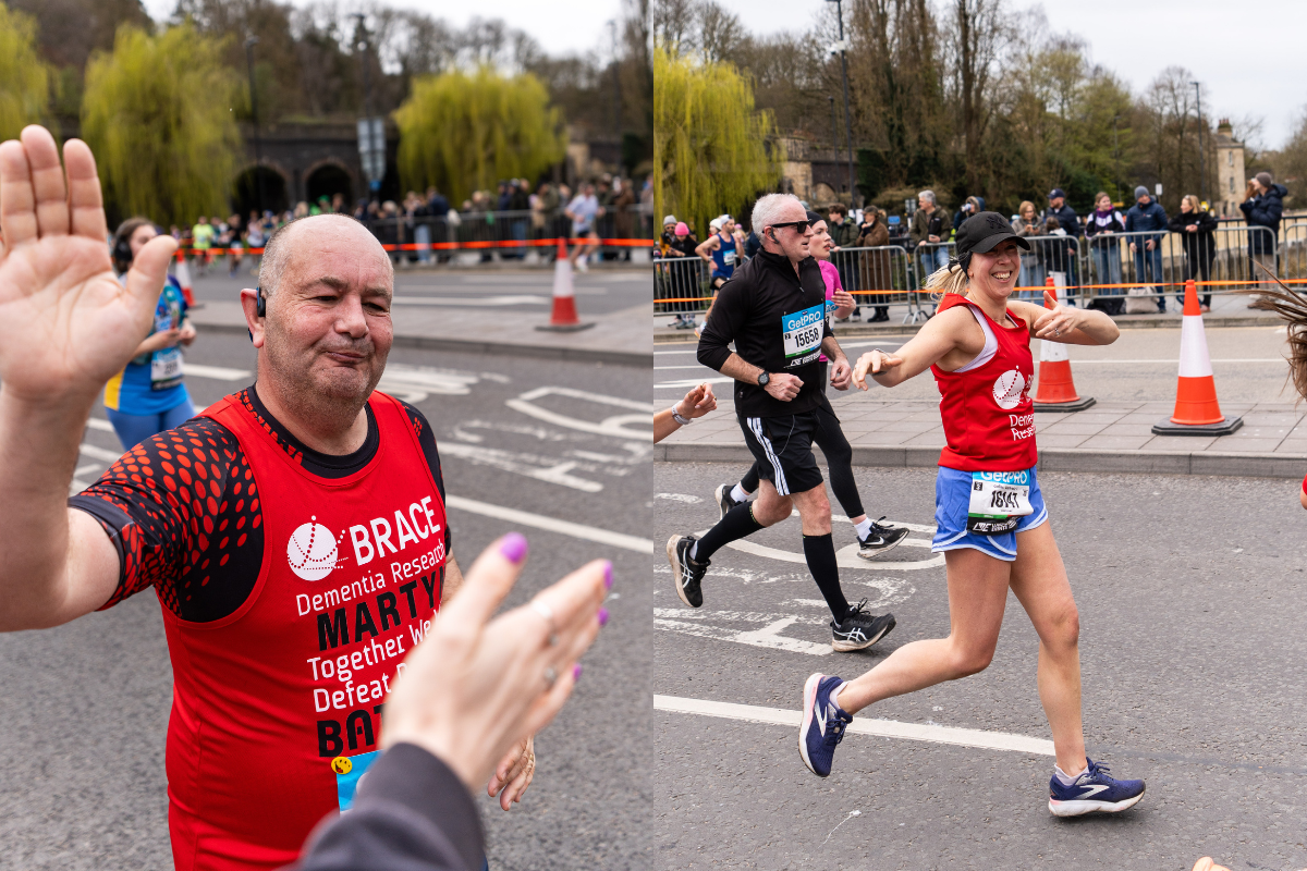 Two BRACE runners wearing red BRACE running vests at the Bath Half Marathon.