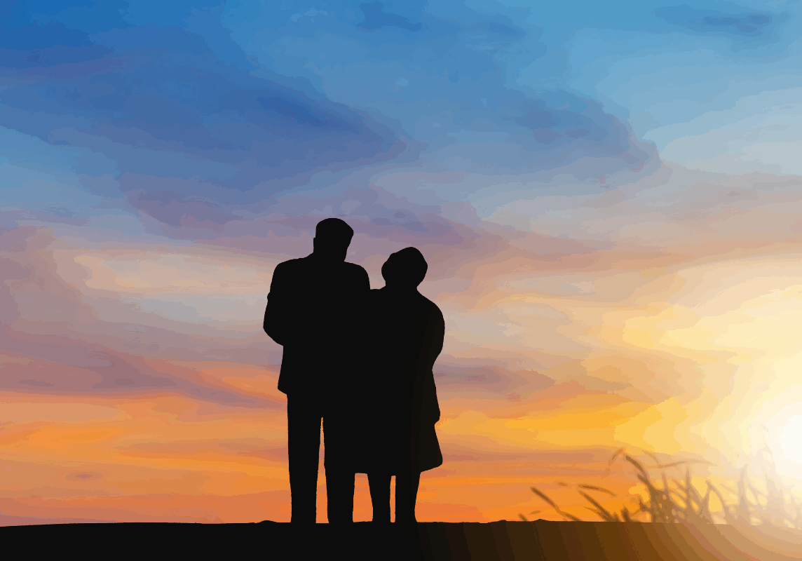 A couple are watching a sunset.