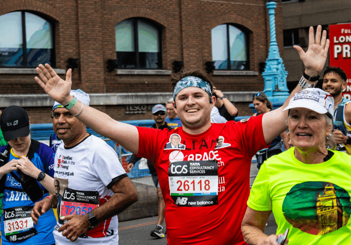 Liam Running over Tower Bridge at the TCS London Marathon 2024